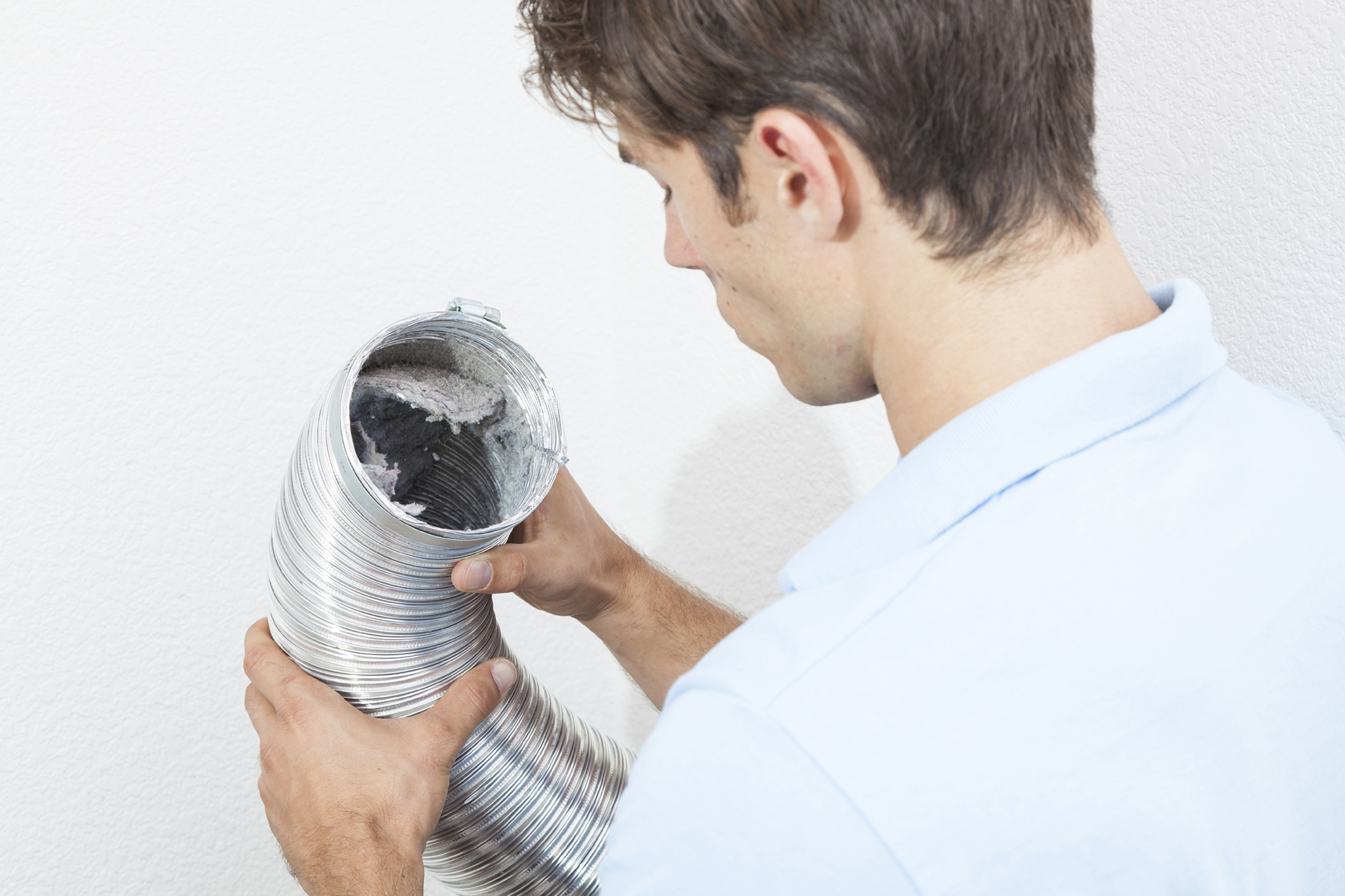 Tech looking into vent hose